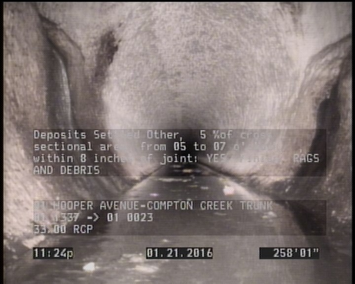 Deposits Settled Other, 5 %of cross sectional area, from 05 to 07 o'clock, , within 8 inches of joint: YES, Finish - RAGS AND DEBRIS
