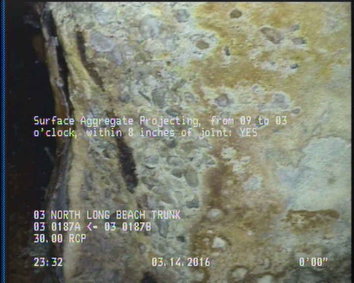 Surface Aggregate Projecting, from 09 to 03 o'clock, within 8 inches of joint: YES