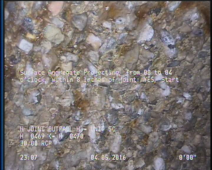 Surface Aggregate Projecting, from 08 to 04 o'clock, within 8 inches of joint: YES