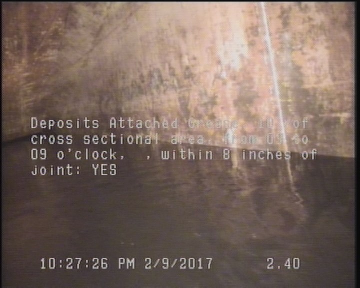 Deposits Attached Grease, 10 %of cross sectional area, from 03 to 09 o'clock, , within 8 inches of joint: YES