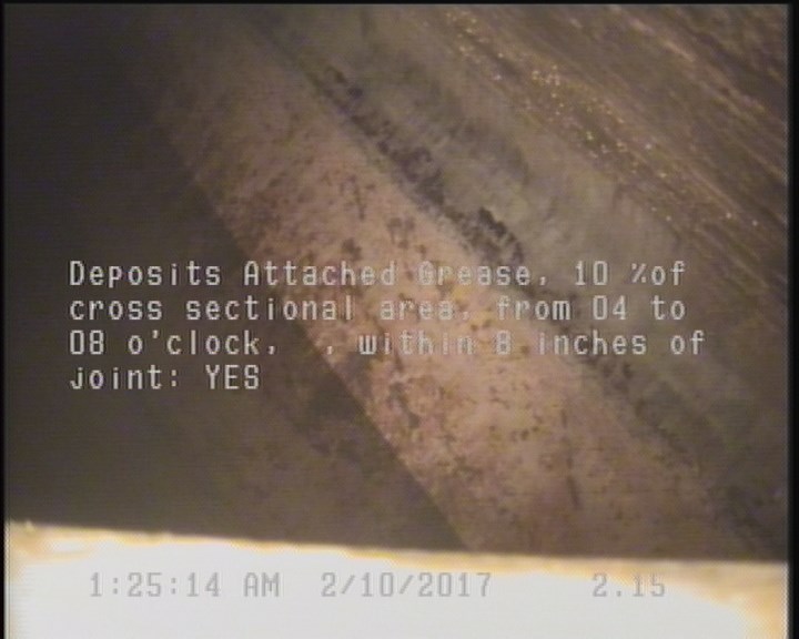 Deposits Attached Grease, 10 %of cross sectional area, from 04 to 08 o'clock, , within 8 inches of joint: YES