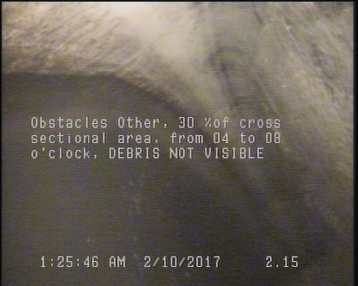 Obstacles Other, 30 %of cross sectional area, from 04 to 08 o'clock - DEBRIS NOT VISIBLE