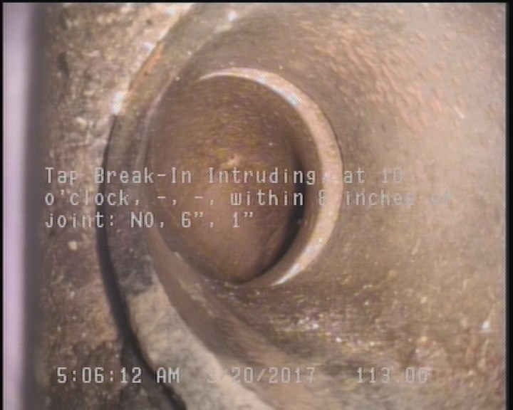 Tap Break-In Intruding, at 10 o'clock, -, -, within 8 inches of joint: NO, 6", 1"