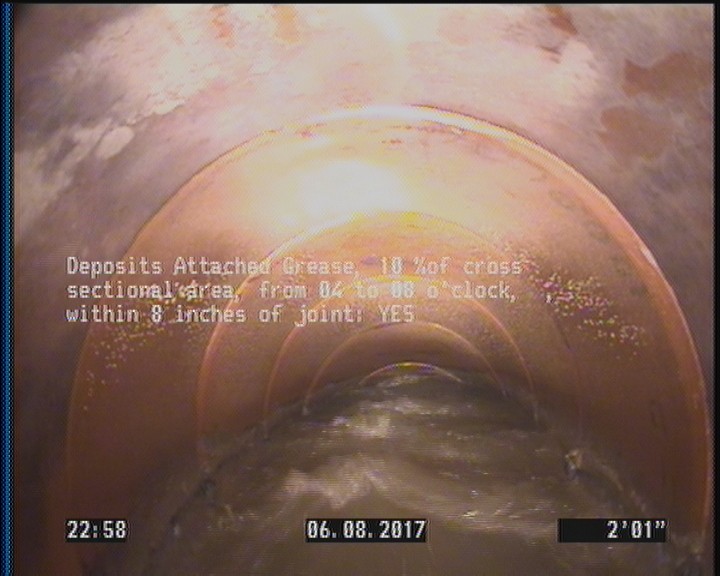 Deposits Attached Grease, 10 %of cross sectional area, from 04 to 08 o'clock, , within 8 inches of joint: YES