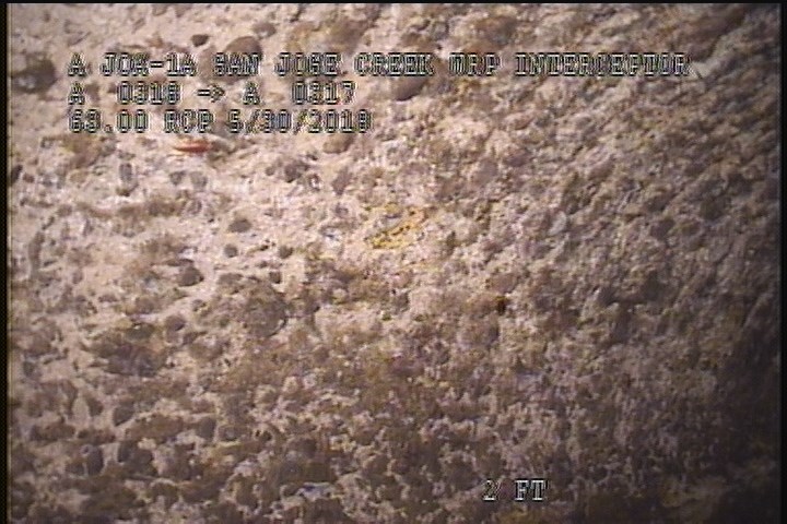 Surface Aggregate Projecting, from 08 to 04 o'clock, within 8 inches of joint: NO