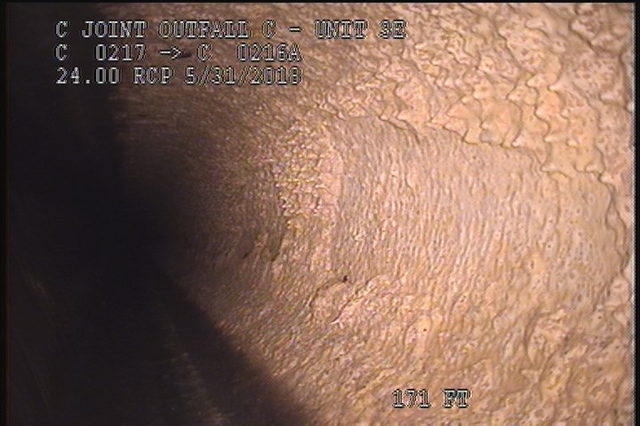 Surface Spalling, from 09 to 03 o'clock, within 8 inches of joint: NO - PEELING CONCRETE UNDER MAG COAT