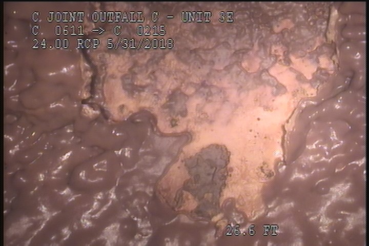 Surface Spalling, from 11 to 01 o'clock, within 8 inches of joint: NO - BLISTERING PEELING CONCRETE UNDER MAG COAT