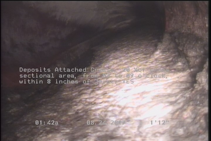 Deposits Attached Grease, 20 %of cross sectional area, from 03 to 09 o'clock, , within 8 inches of joint: YES