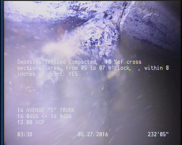 Deposits Settled Compacted, 10 %of cross sectional area, from 05 to 07 o'clock, , within 8 inches of joint: YES