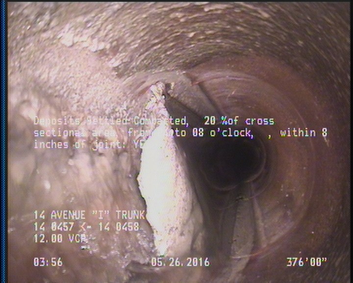 Deposits Settled Compacted, 20 %of cross sectional area, from 04 to 08 o'clock, , within 8 inches of joint: YES