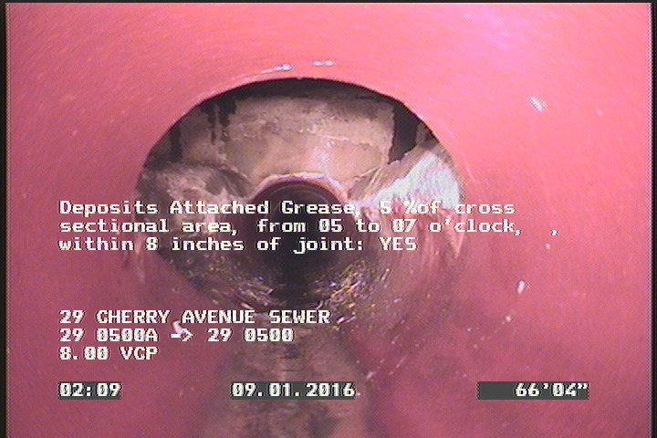 Deposits Attached Grease, 5 %of cross sectional area, from 05 to 07 o'clock, , within 8 inches of joint: YES