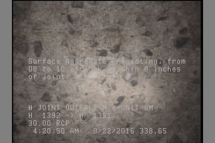 Surface Aggregate Projecting, from 08 to 10 o'clock, within 8 inches of joint: YES