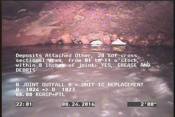 Deposits Attached Other, 20 %of cross sectional area, from 01 to 11 o'clock, , within 8 inches of joint: YES - GREASE AND DEBRIS