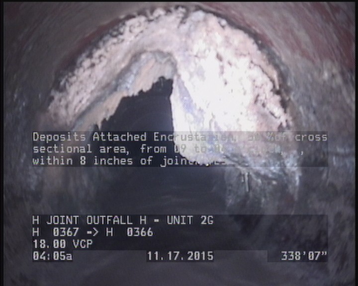 Deposits Attached Encrustation, 20 %of cross sectional area, from 09 to 04 o'clock, , within 8 inches of joint: YES