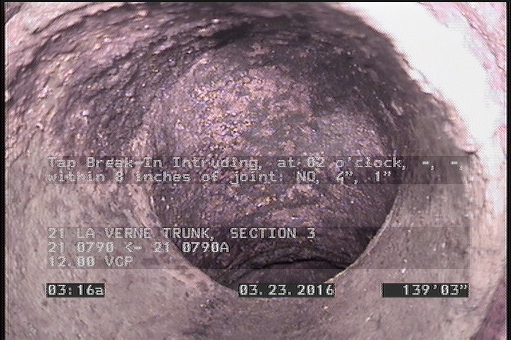 Tap Break-In Intruding, at 02 o'clock, -, -, within 8 inches of joint: NO, 4", 1"