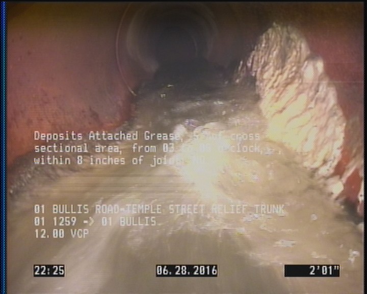 Deposits Attached Grease, 5 %of cross sectional area, from 03 to 05 o'clock, , within 8 inches of joint: NO