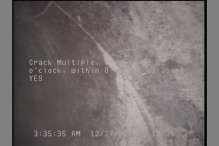 Crack Multiple, from 10 to 02 o'clock, within 8 inches of joint: YES