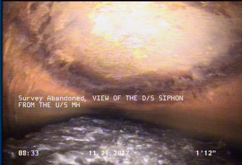 Survey Abandoned - VIEW OF THE D/S SIPHON FROM THE U/S MH