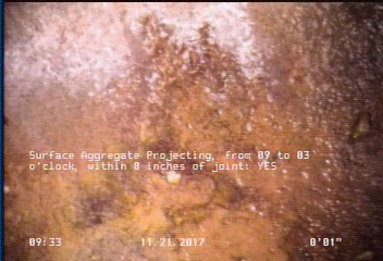 Surface Aggregate Projecting, from 09 to 03 o'clock, within 8 inches of joint: YES