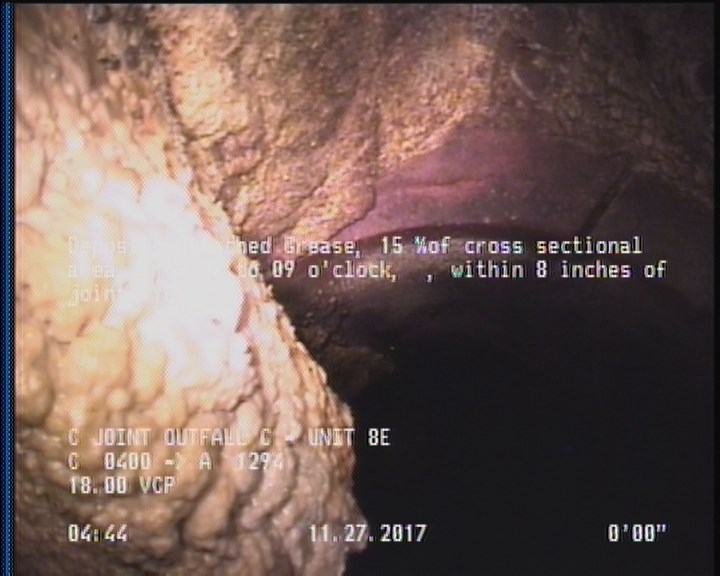 Deposits Attached Grease, 15 %of cross sectional area, from 07 to 09 o'clock, , within 8 inches of joint: YES