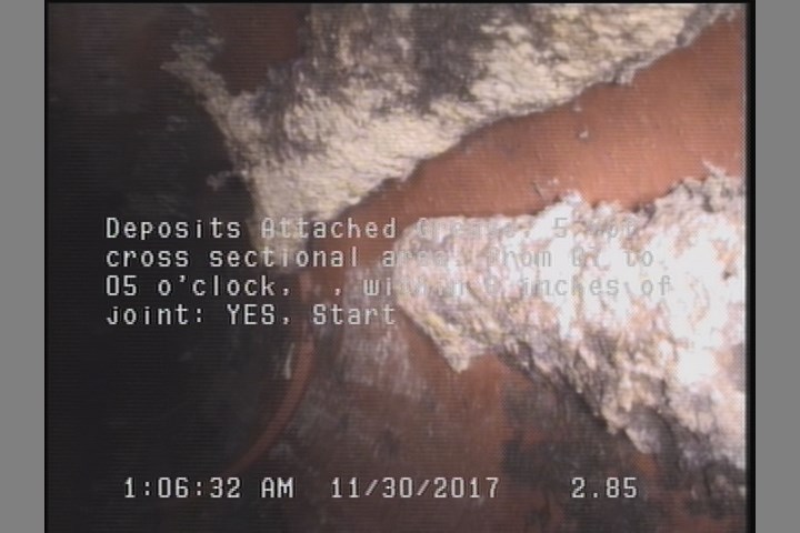 Deposits Attached Grease, 5 %of cross sectional area, from 07 to 05 o'clock, , within 8 inches of joint: YES, Start