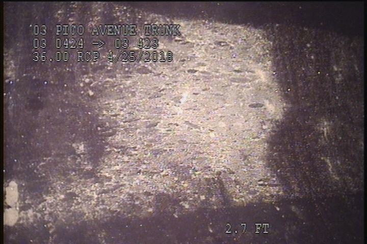 Surface Spalling, from 08 to 04 o'clock, within 8 inches of joint: YES, Start - POSSIBLE GREASE/DEBRIS LAYER ON THE LINER