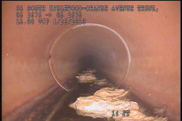 Deposits Settled Other, 5 %of cross sectional area, from 05 to 07 o'clock, , within 8 inches of joint: YES, Start - SLUDGE-PAPER