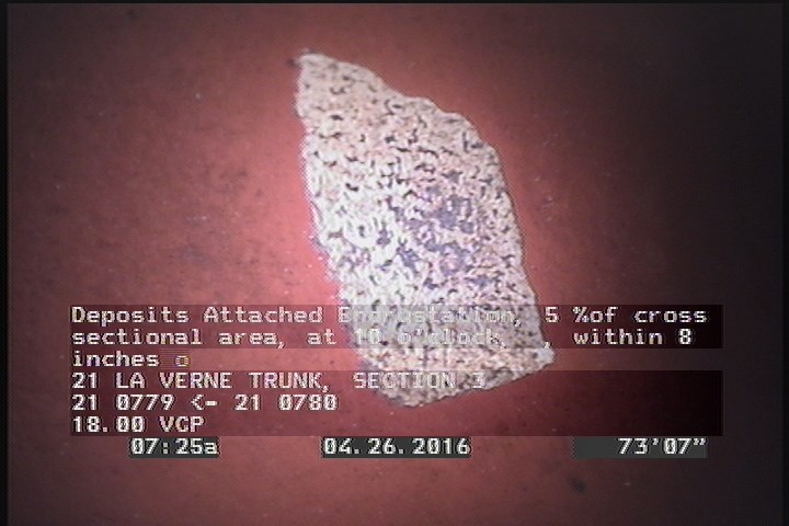 Deposits Attached Encrustation, 5 %of cross sectional area, at 10 o'clock, , within 8 inches of joint: NO