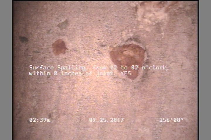 Surface Spalling, from 12 to 02 o'clock, within 8 inches of joint: YES