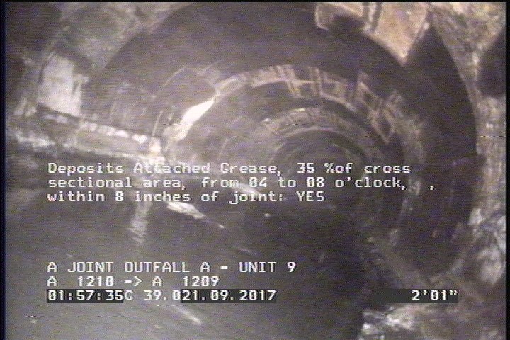 Deposits Attached Grease, 35 %of cross sectional area, from 04 to 08 o'clock, , within 8 inches of joint: YES