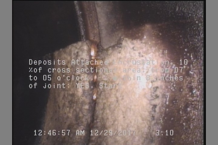Deposits Attached Encrustation, 10 %of cross sectional area, from 07 to 05 o'clock, , within 8 inches of joint: YES, Start