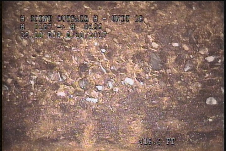 Surface Aggregate Projecting, from 03 to 04 o'clock, within 8 inches of joint: NO