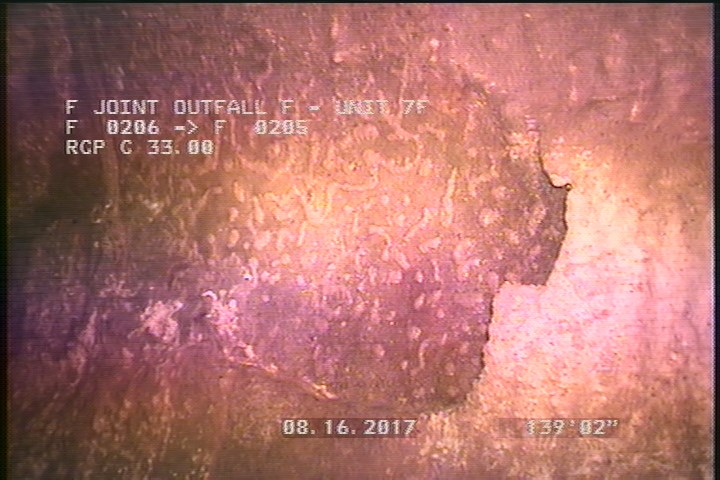 Surface Spalling, from 08 to 04 o'clock, within 8 inches of joint: YES - BLISTERING PEELING CONCRETE UNDER MAG COAT