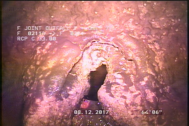 Tap Factory Made, at 02 o'clock, -, within 8 inches of joint: YES, 6" - ACTIVE POSSIBLE MINERIAL DEPOSITS AROUND