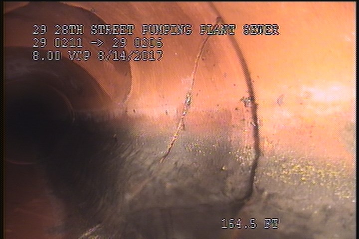 Broken, from 05 to 07 o'clock, within 8 inches of joint: YES