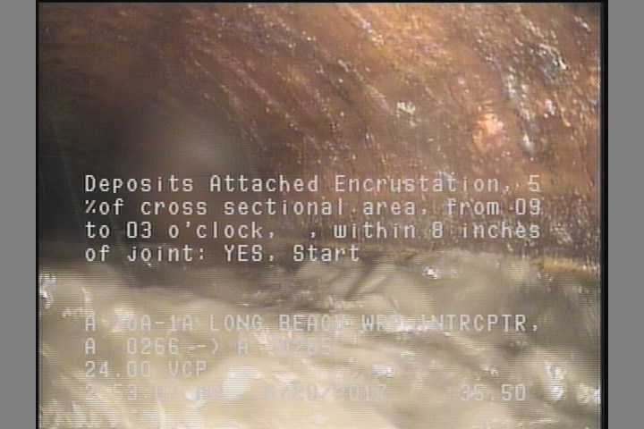 Deposits Attached Encrustation, 5 %of cross sectional area, from 09 to 03 o'clock, , within 8 inches of joint: YES, Start