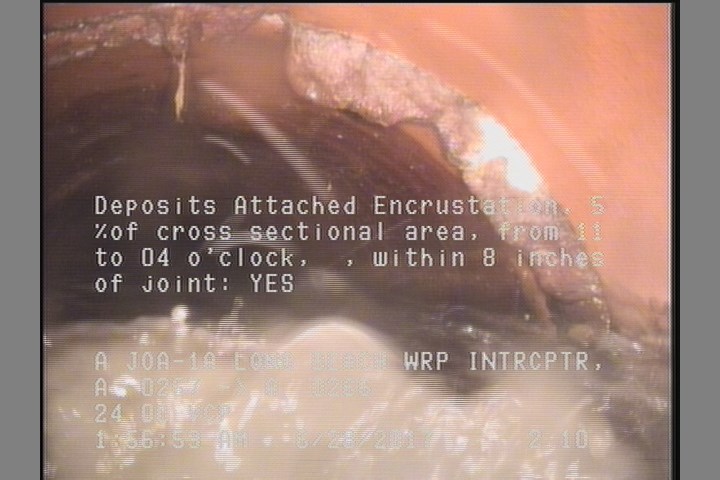 Deposits Attached Encrustation, 5 %of cross sectional area, from 11 to 04 o'clock, , within 8 inches of joint: YES