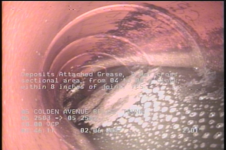 Deposits Attached Grease, 5 %of cross sectional area, from 04 to 08 o'clock, , within 8 inches of joint: YES