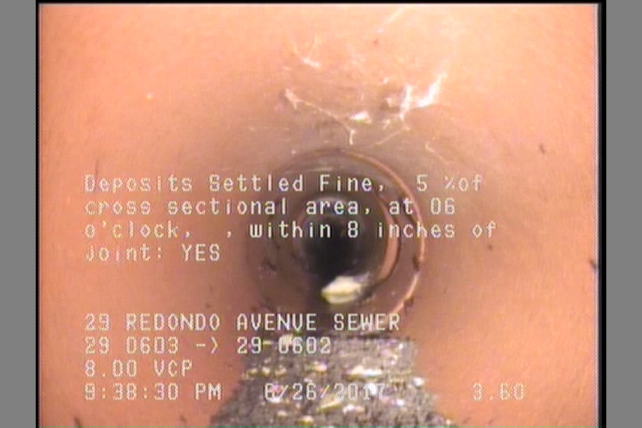 Deposits Settled Fine, 5 %of cross sectional area, at 06 o'clock, , within 8 inches of joint: YES