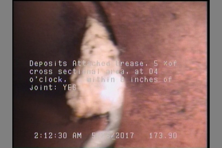 Deposits Attached Grease, 5 %of cross sectional area, at 04 o'clock, , within 8 inches of joint: YES