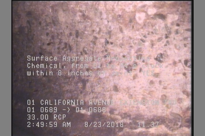 Surface Aggregate Projecting, from 01 to 04 o'clock, within 8 inches of joint: NO