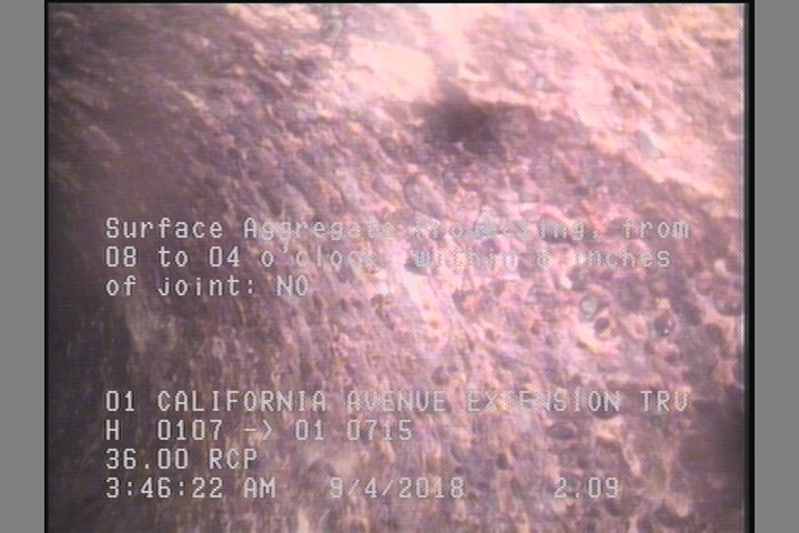 Surface Aggregate Projecting, from 08 to 04 o'clock, within 8 inches of joint: NO