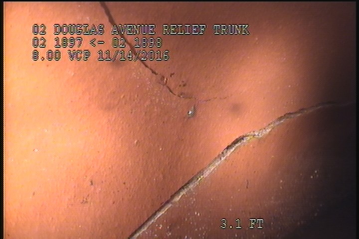 Broken, from 09 to 02 o'clock, within 8 inches of joint: YES - POSSIBLY FROM JOINT TO JOINT