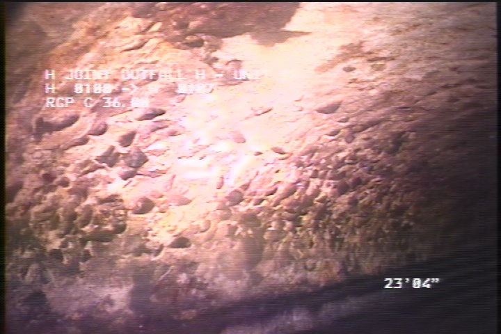 Surface Aggregate Projecting, from 08 to 04 o'clock, within 8 inches of joint: NO - SEVERE AGG