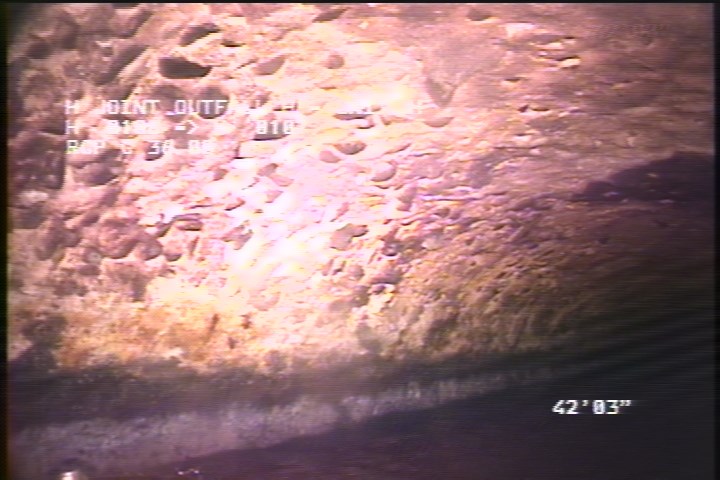 Surface Aggregate Projecting, from 08 to 04 o'clock, within 8 inches of joint: YES - SEVERE AGG