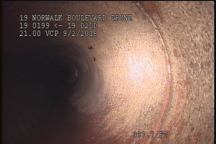 General Observation - SLIGHT GREASE/CALCIUM/SCALE THROUGHOUT THE REACH