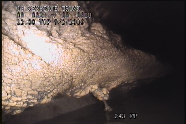 Deposits Attached Grease, 15 %of cross sectional area, at 09 o'clock, , within 8 inches of joint: YES