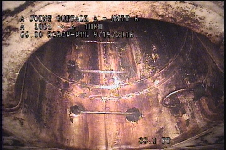 General Observation - STOPLOG IN PLACE INSIDE THE MH. @ 09 O'CLOCK
