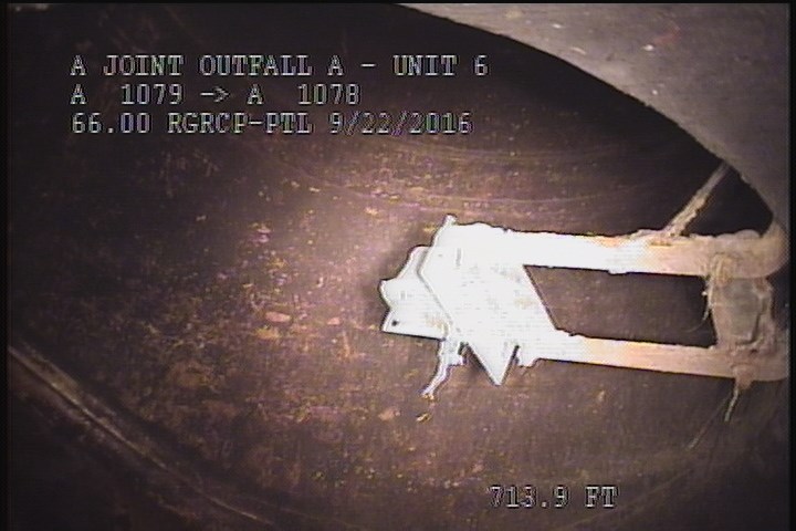Downstream Manhole, Survey Ends - 9:59 AM, FLOW METER INSIDE THE MH.