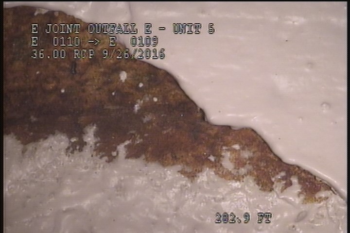 Surface Spalling, at 03 o'clock, within 8 inches of joint: NO - SWOLLEN CONCRETE UNDER MAG COAT
